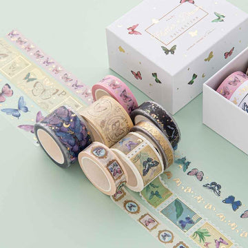 Close up of Tsuki ‘Flutter + Dream’ Washi Tape Set by Notebook Therapy x Pelinkan rolled out on mint background